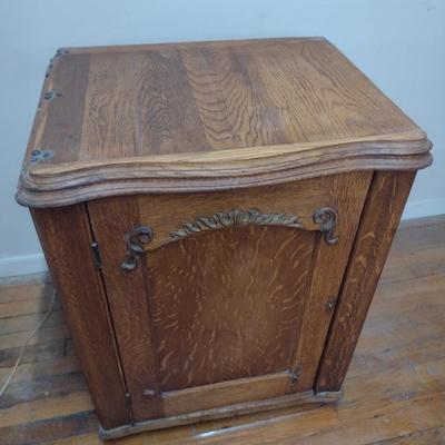 Antique Cast Body Minnesota Treadle Sewing Machine in Oak Cabinet