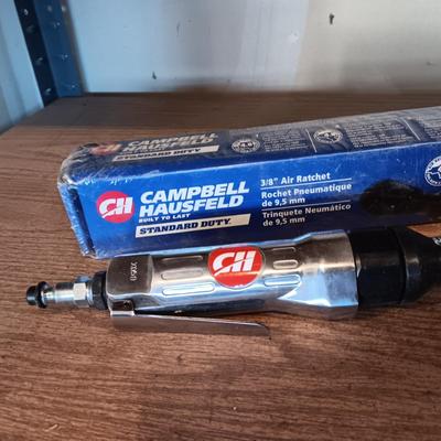 CAMPBELL HAUSFELD 3/8" AIR RATCHET AND SOCKETS IN A METAL CASE