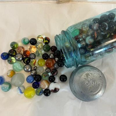 Vintage marbles in a ball pint jar
