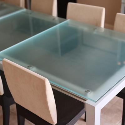 LIGNE ROSET Extendable Glass Table with Ten Dining Chairs