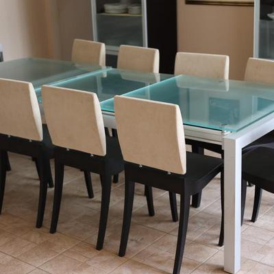 LIGNE ROSET Extendable Glass Table with Ten Dining Chairs