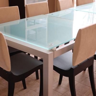 LIGNE ROSET Extendable Glass Table with Ten Dining Chairs