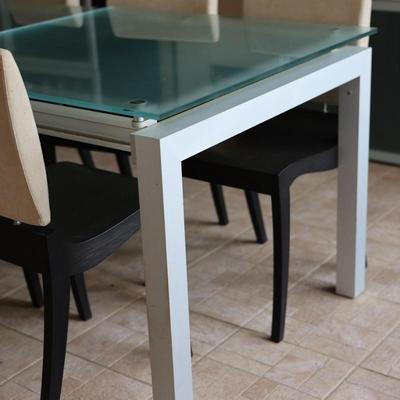 LIGNE ROSET Extendable Glass Table with Ten Dining Chairs