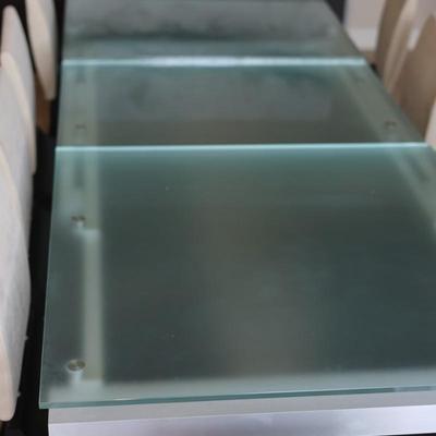 LIGNE ROSET Extendable Glass Table with Ten Dining Chairs
