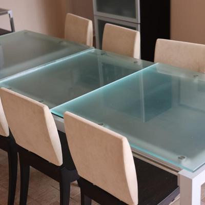 LIGNE ROSET Extendable Glass Table with Ten Dining Chairs