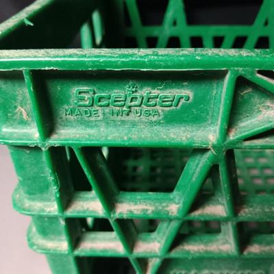 HEAVY PLASTIC MILK CRATE AND A METAL FIRST-AID KIT WITH SOME CONTENTS