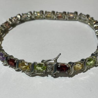 Vintage .925 Sterling Silver Multi-color Stone 7.5" Bracelet in Very Good Preowned Condition.