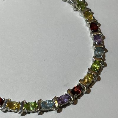 Vintage .925 Sterling Silver Multi-color Stone 7.5" Bracelet in Very Good Preowned Condition.