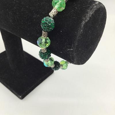 Green beaded charm bracelet