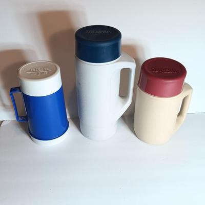 Three thermos- like containers 10-ounce food jar Model 4215 thermos - and model 4415