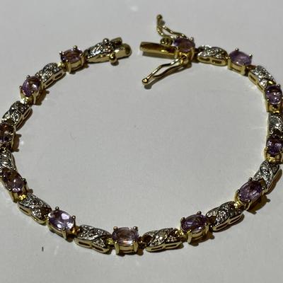 Vintage Estate .925 Gold-toned Sterling Silver Amethyst Color Stone Tennis Bracelet 7-1/3" in Good Preowned Condition.