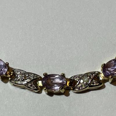 Vintage Estate .925 Gold-toned Sterling Silver Amethyst Color Stone Tennis Bracelet 7-1/3" in Good Preowned Condition.