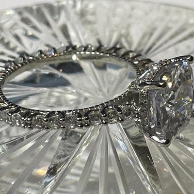 Vintage Estate Unique .925 Sterling Silver Size 9 Engagement Ring w/CZ's Mounted all Around in Never Worn Preowned Condition.