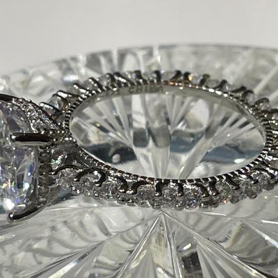 Vintage Estate Unique .925 Sterling Silver Size 9 Engagement Ring w/CZ's Mounted all Around in Never Worn Preowned Condition.