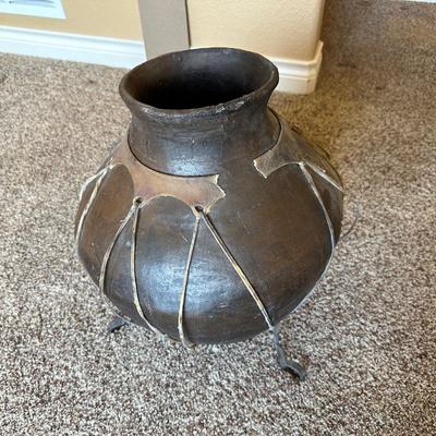 LARGE RAWHIDE BOUND CLAY POT ON IRON STAND