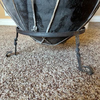 LARGE RAWHIDE BOUND CLAY POT ON IRON STAND