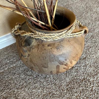 CLAY POT WITH FAUX FOLIAGE AND UNIQUELY WEAVED BASKET