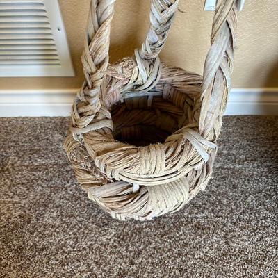 CLAY POT WITH FAUX FOLIAGE AND UNIQUELY WEAVED BASKET