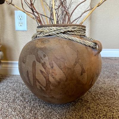 CLAY POT WITH FAUX FOLIAGE AND UNIQUELY WEAVED BASKET