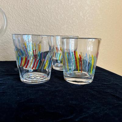 8 MURANO STYLE MUTLI-COLOR GLASSES AND A PITCHER
