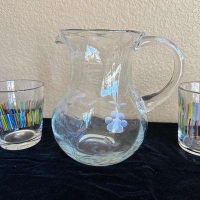 8 MURANO STYLE MUTLI-COLOR GLASSES AND A PITCHER