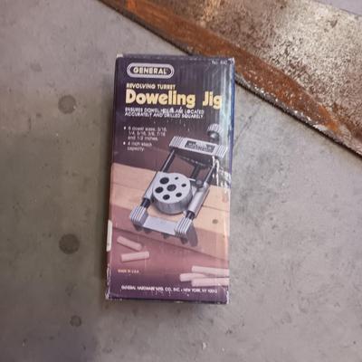 DOWELING JIG AND A DISSTON HAND SAW