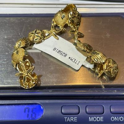 Vintage Never Worn 14K Starfish & Sand Dollar Bracelet 7" Weighing 7,5 Pennyweights as Pictured.