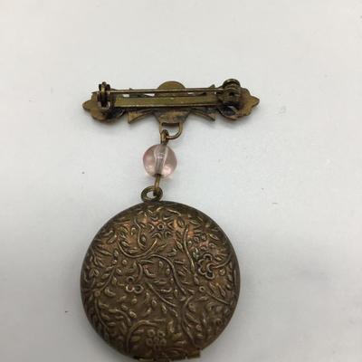 Vintage pin with locket