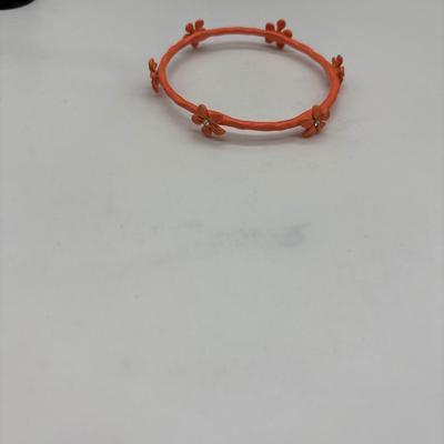 Orange bracelet with flowers