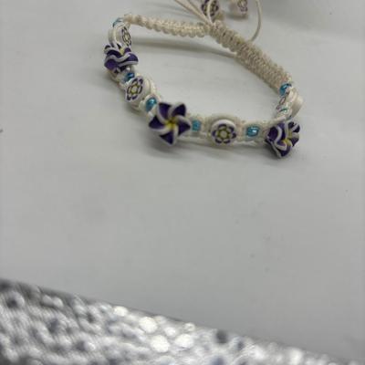 White bracelet with flowers