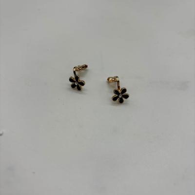 Vintage black flower clip on earrings