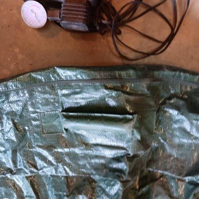 LARGE ZIPPERED BAG, TIRE CHAINS, 2 SLIP ON SHOES ICE GRIPS, AUTO AIR COMPRESSOR