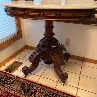 E1- marble top table