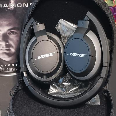LOT 53: Bose SoundLink Headphones with Large CD Assortment