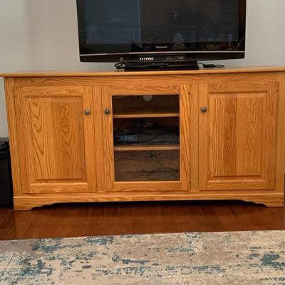 LOT:57: Contemporary Wood Media Cabinet with Center Glass Door