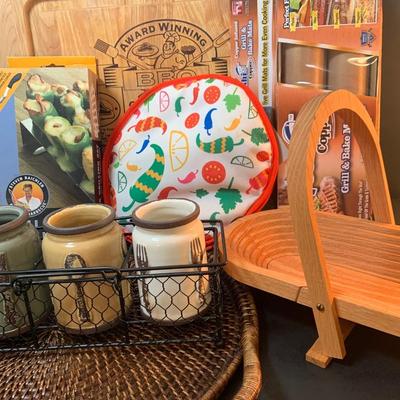 LOT:73: Grilling Must Haves Including Large Wood Cutting/Carving Board, Folding Basket/Cutting Board, Rattan Serving Tray Cookbooks and More