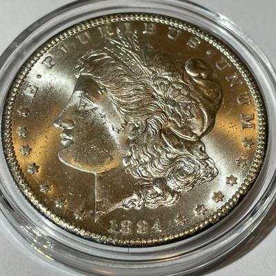 1884-CC Morgan Silver Dollar. VAM-2. Repunched Date, 18/18. MS-63 Condition Uncertified as Pictured.