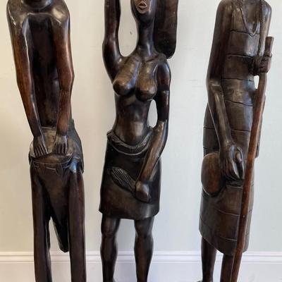 Three Tall Robust Wood African Statues