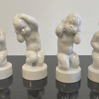 Four Royal Copenhagen Baby Boy and Girl Porcelain Figurines