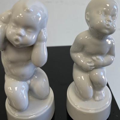 Four Royal Copenhagen Baby Boy and Girl Porcelain Figurines
