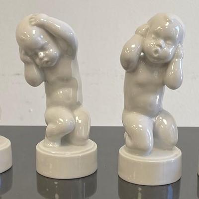 Four Royal Copenhagen Baby Boy and Girl Porcelain Figurines