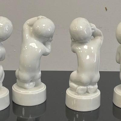 Four Royal Copenhagen Baby Boy and Girl Porcelain Figurines