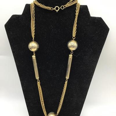 Gold toned long fashion necklace