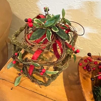 Primitive wood bowl with Christmas greenery