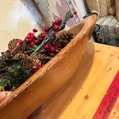 Primitive wood bowl with Christmas greenery