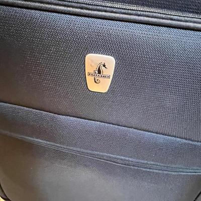 2 black matching suit cases