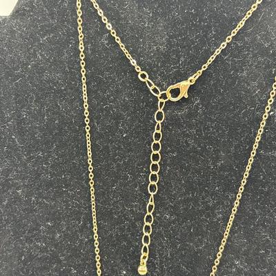 Gold toned crystal necklace
