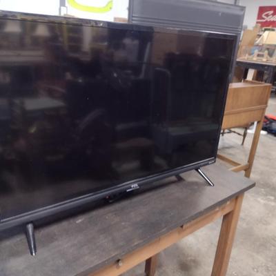 TCL Roku TV Flat Screen Television- Approx 31"- Item is in Working Condition- Model 32S327