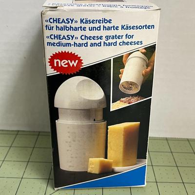 Cheasy White Handheld Cheese Grater
