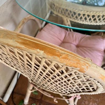 Wicker and glass patio table set
